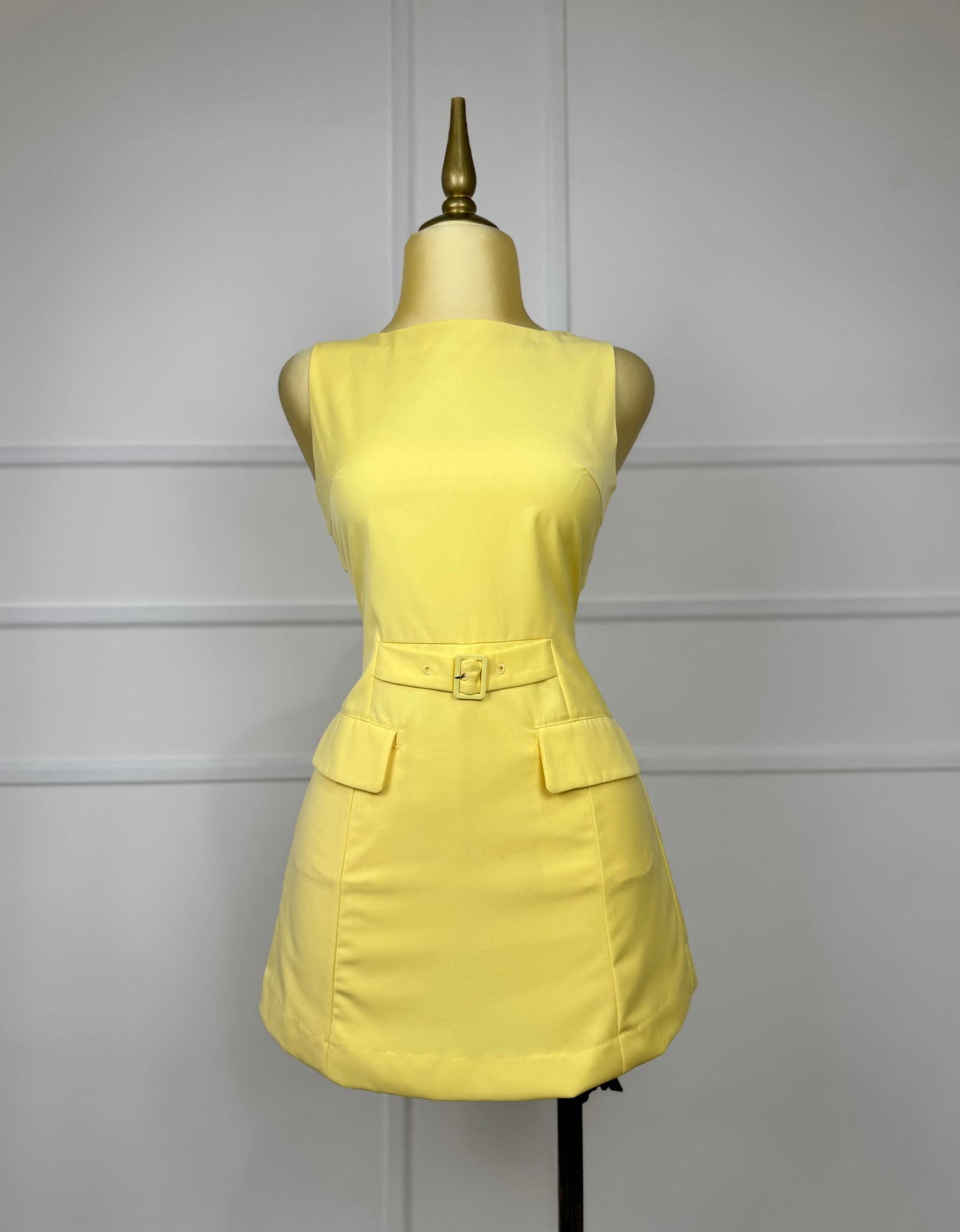 Jumper amarillo corto con bolsas